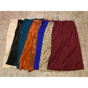 Bundle of 8 satin midi skirts